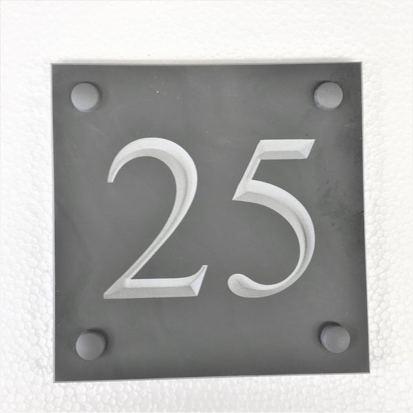 Slate house number 25 on a 100mm x 100mm grey slate using Times New Roman font -on charcoal slate with white paint
